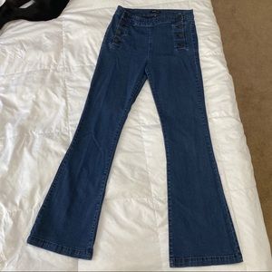 Flared stretchy blue jeans